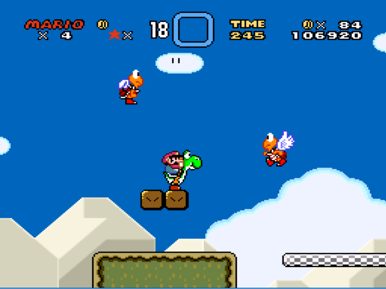 Mario rides Yoshi in the SNES platformer Super Mario World