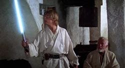 Luke Skywalker receives his father's lightsaber. Luke Skywalker receives his father's lightsaber.