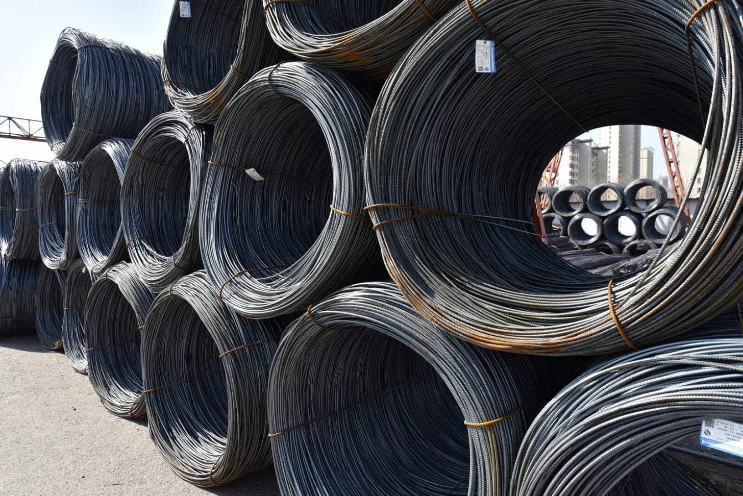 Photo showing steel wire stacked on top of one another. Photo showing steel wire stacked on top of one another.
