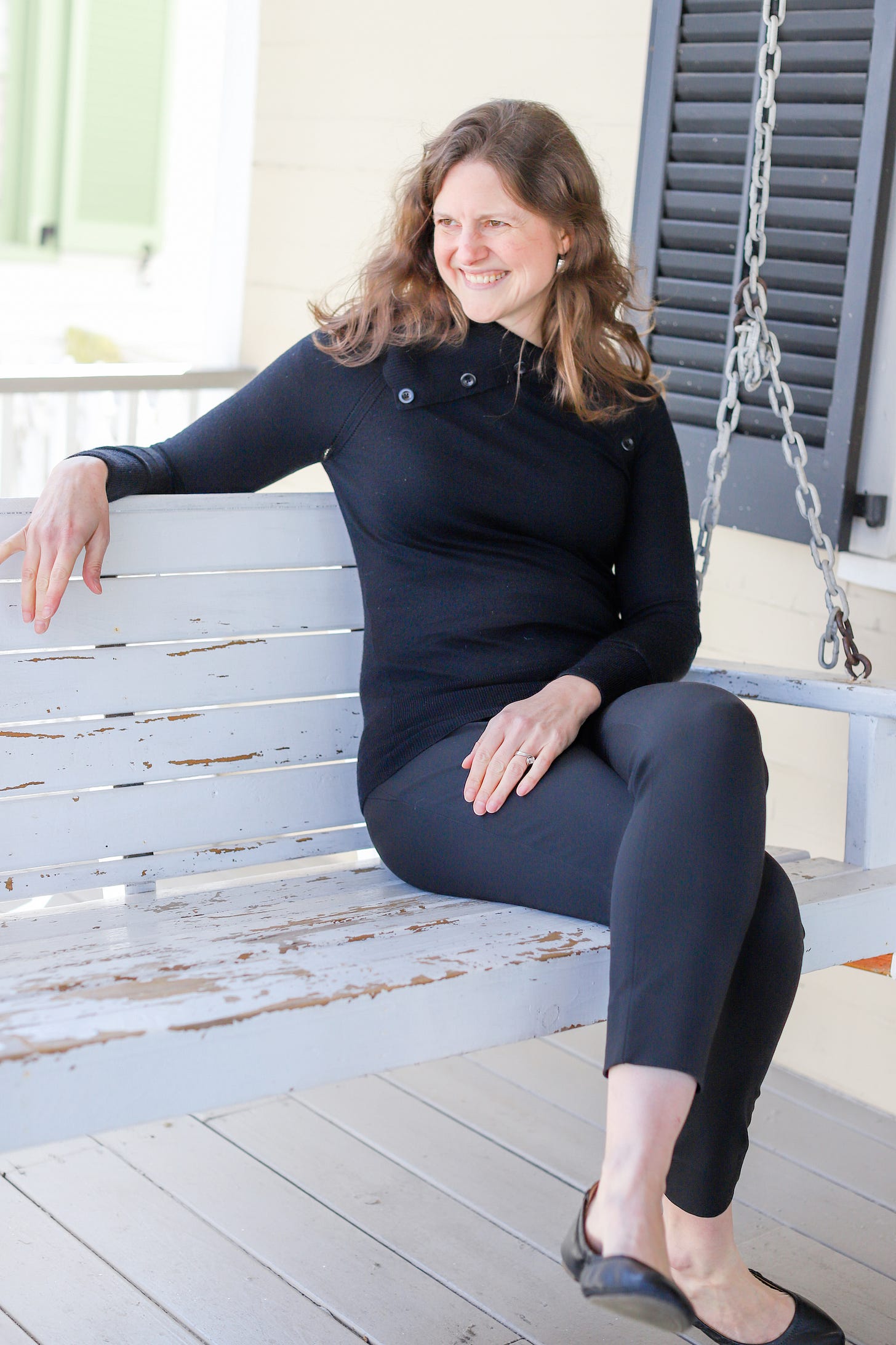 Catherine on a porch swing