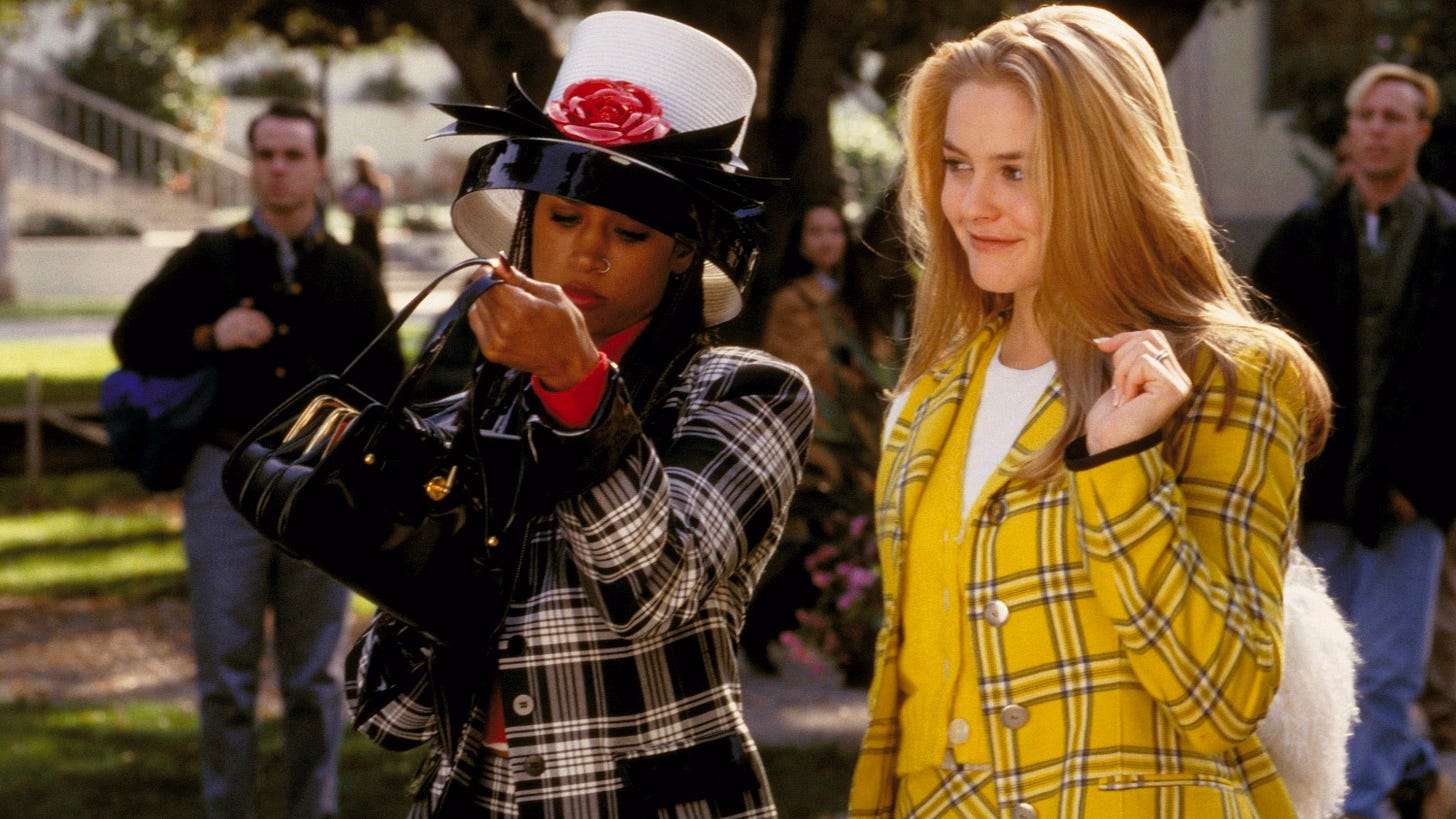 Clueless | Still features Alicia Silverstone as Cher Horowitz dressed in yellow plaid, together with Stacey Dash as Dionne Davenport dressed in black plaid. Clueless | Still features Alicia Silverstone as Cher Horowitz dressed in yellow plaid, together with Stacey Dash as Dionne Davenport dressed in black plaid.