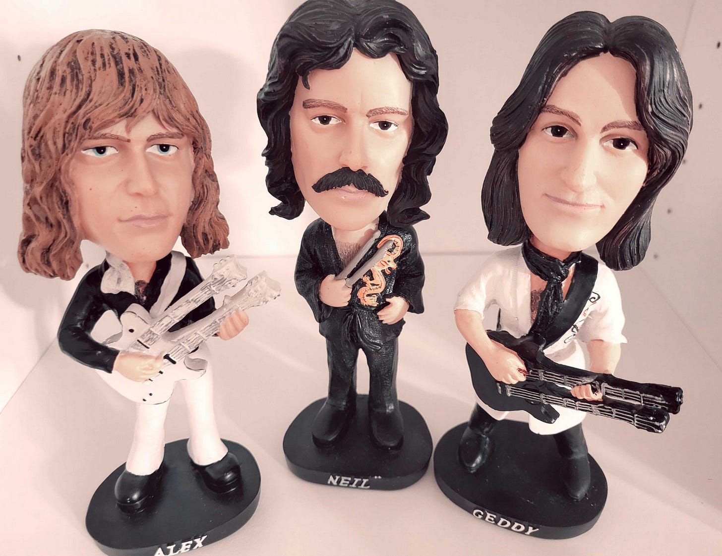 grainy pics of my rush bobbleheads are about as archival as I go