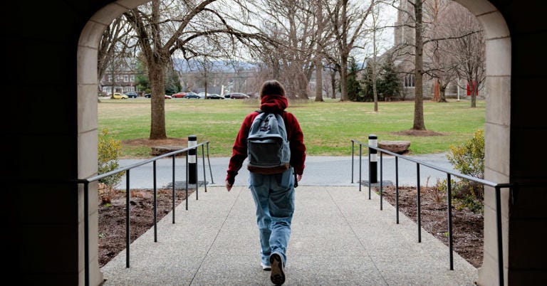 A person walks on campus at Muhlenberg College in Allentown, Pennsylvania, U.S. March 26, 2025. 