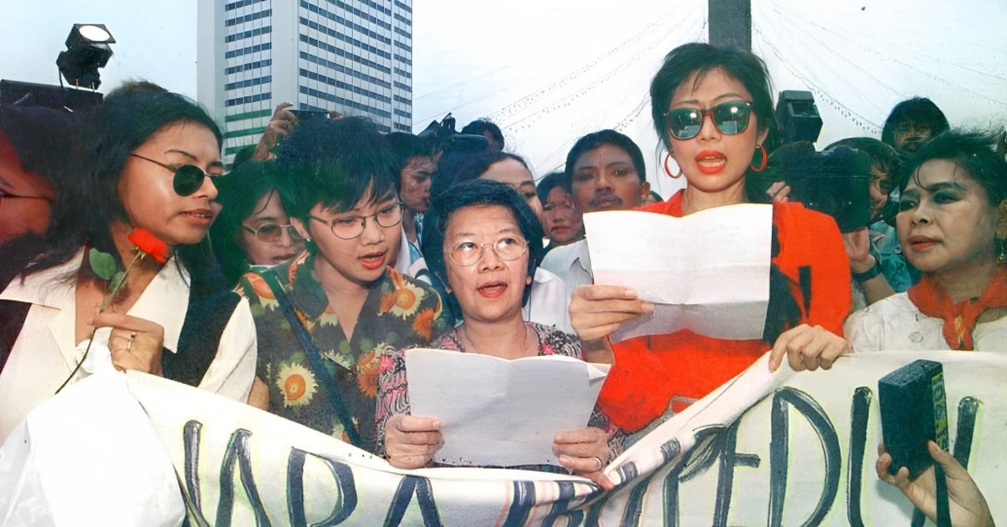 Julia Suryakusuma (in red) at a women’s rally in 1998. Photo: Handout