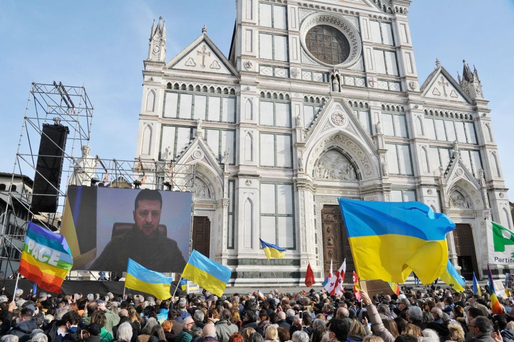 Ukrainian President Volodymyr Zelensky connects via live video link to an anti-war demonstration on March 12, 2022 Ukrainian President Volodymyr Zelensky connects via live video link to an anti-war demonstration on March 12, 2022