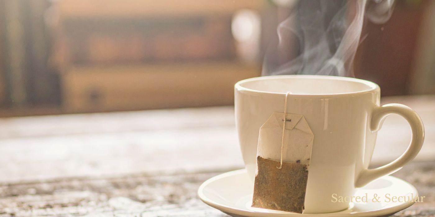 A steaming cup of tea on a wooden table, lit by soft afternoon sunlight from a nearby window, creating a calm and reflective atmosphere A steaming cup of tea on a wooden table, lit by soft afternoon sunlight from a nearby window, creating a calm and reflective atmosphere