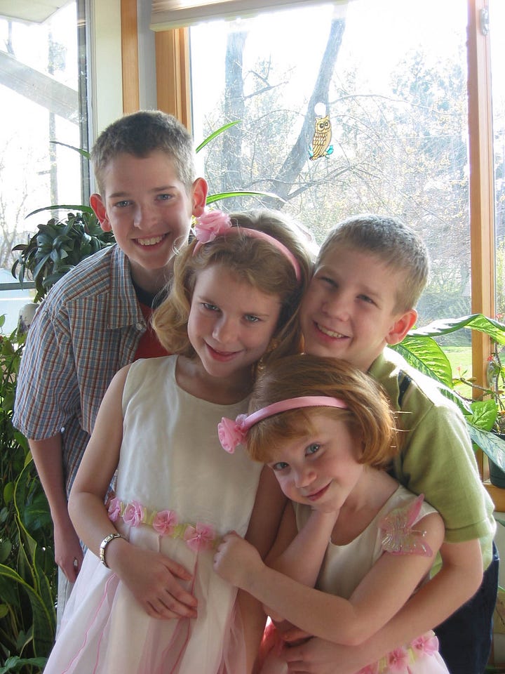 Author's family and children in matching Easter clothes, all smiling and happy.