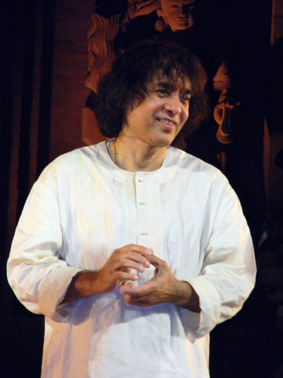 A smiling Ustad Zakir Hussain. Picture Credit: Wikipedia