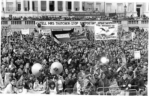 Gallery of six images: top three (black and white) are photographs of protests from the Reagan era, bottom three are photographs of protests/marches in the modern day, showing Americans marching for similar if not the same causes