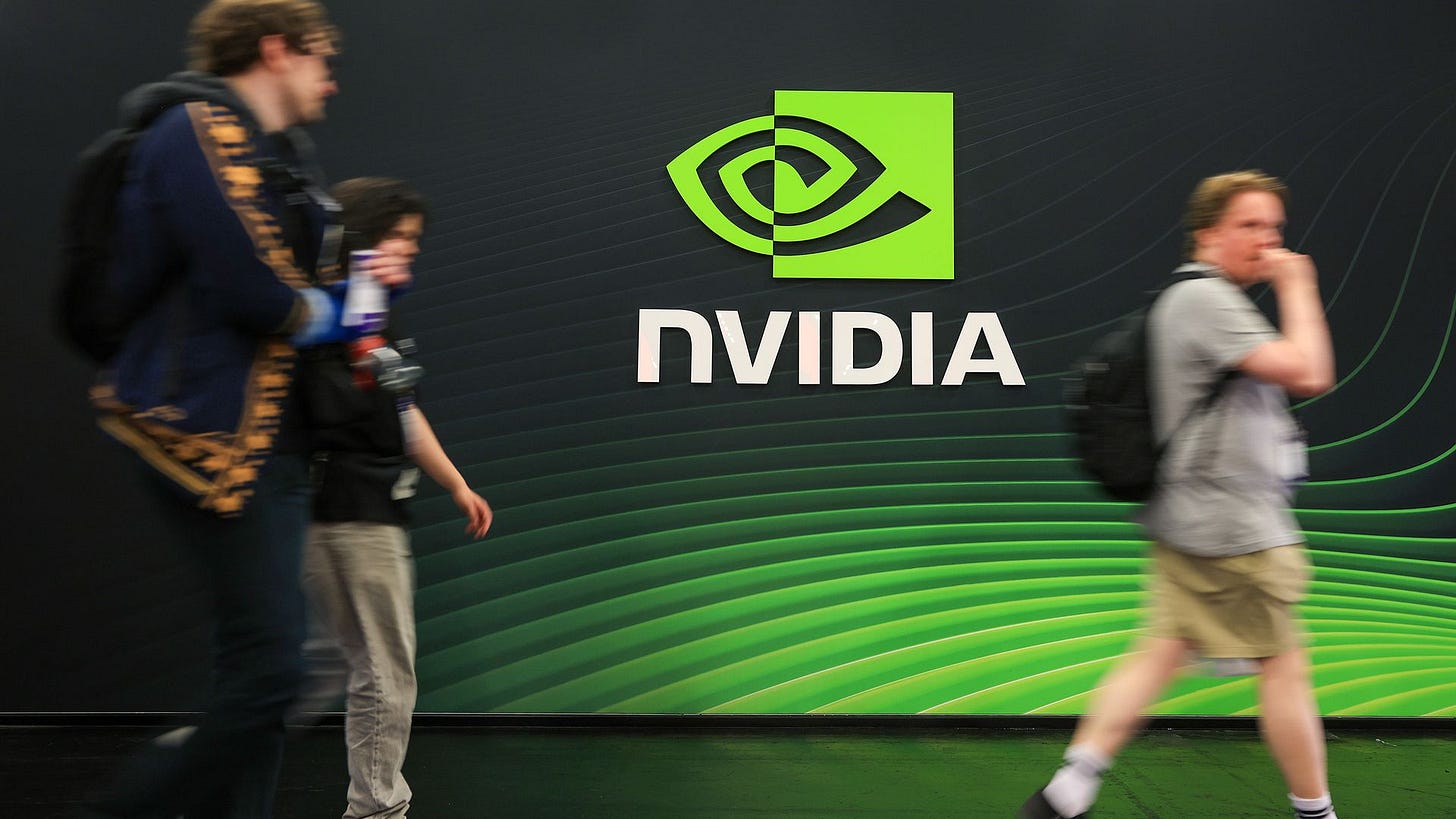 GPToast - Blurred people walk past a dark wall featuring a bright green NVIDIA logo and the word NVIDIA in white, with curved green lines in the background.