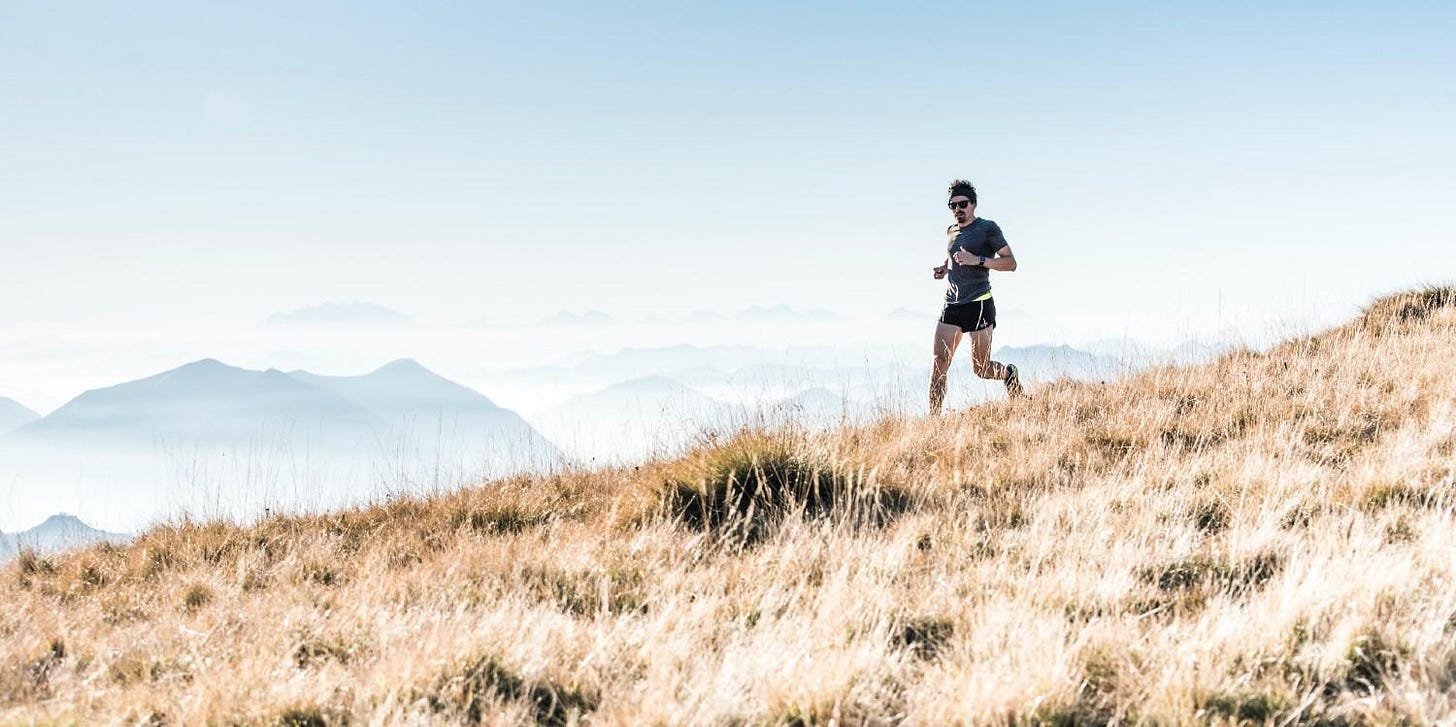 man running cross-country man running cross-country