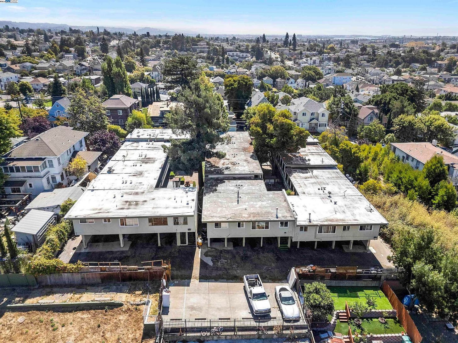 Aerial view of 2515 10th Avenue, looking southeast at the rear of the property in 2025. Oakland, California. (Image source: Bay East Association of Realtors)