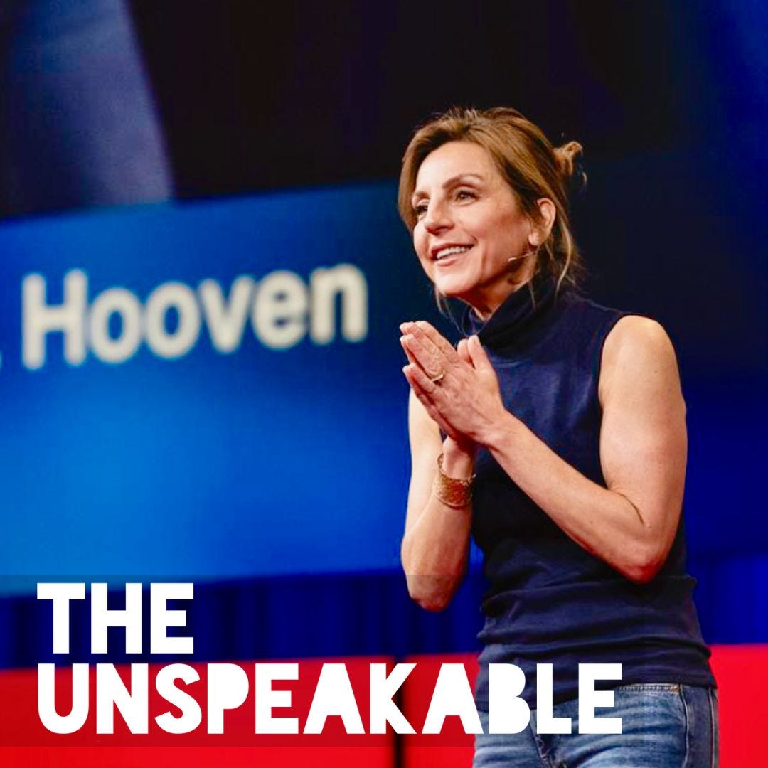 Dr. Carole Hooven speaks on stage at her TED Talk