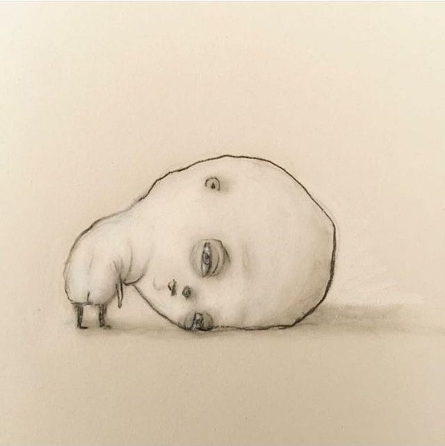 This may contain: a drawing of a baby laying on the ground with its head down and eyes closed