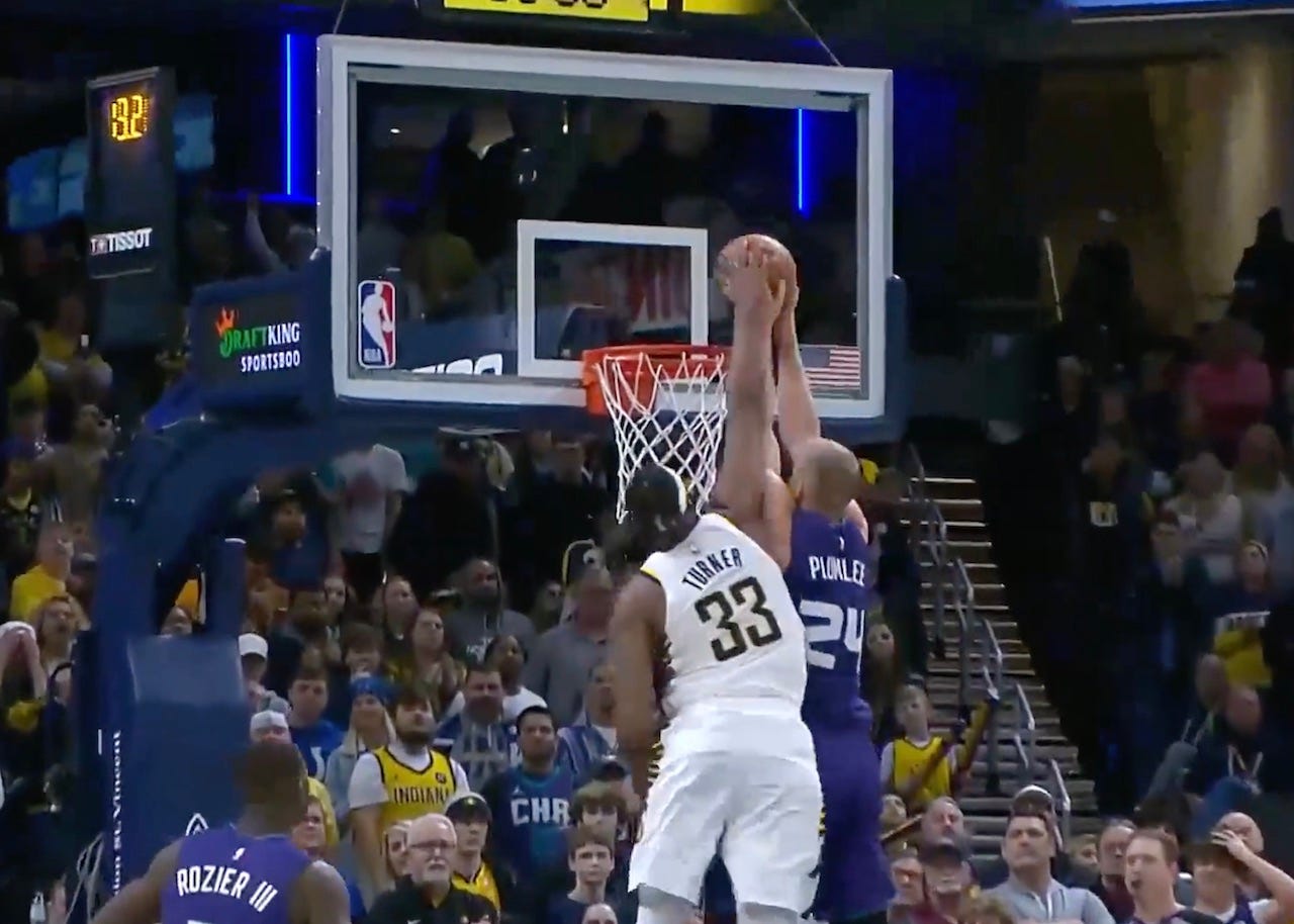 The play of the game with 12 seconds left, Turner stuffs Mason Plumlee.