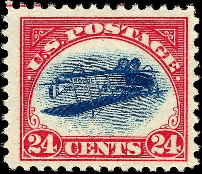 u.s. postage stamp of a plane flying upside -- red decoration and blue plane u.s. postage stamp of a plane flying upside -- red decoration and blue plane