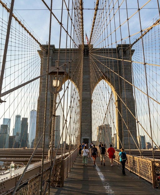 May be an image of the Brooklyn Bridge