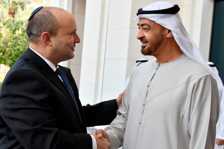 Israeli Prime Minister Naftali Bennett, left, shakes hands with Sheikh Mohammed bin Zayed Al Nahyan, then crown prince of Abu Dhabi in Abu Dhabi, United Arab Emirates, Dec. 13, 2021. Israeli Prime Minister Naftali Bennett, left, shakes hands with Sheikh Mohammed bin Zayed Al Nahyan, then crown prince of Abu Dhabi in Abu Dhabi, United Arab Emirates, Dec. 13, 2021.