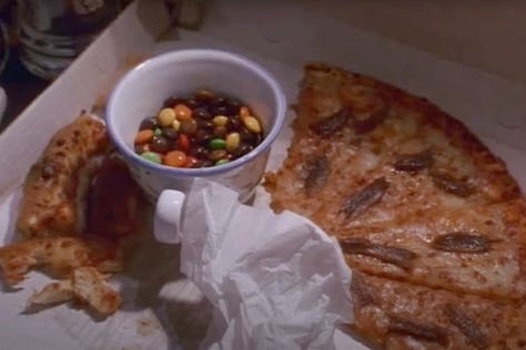 A computer displaying a pizza.net online pizza ordering system, and the resulting pizza, in The Net (1995) movie with Sandra Bullock | Film Flavor: A Newsletter Surveying Food in Film
