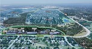 Aerial view of Buda TX showing new master‑planned communities and green spaces. Aerial view of Buda TX showing new master‑planned communities and green spaces.