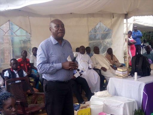 Chris Msando's bother Peter addresses residents at Lifunga in Ugenya during a memorial service on August 17, 2018.