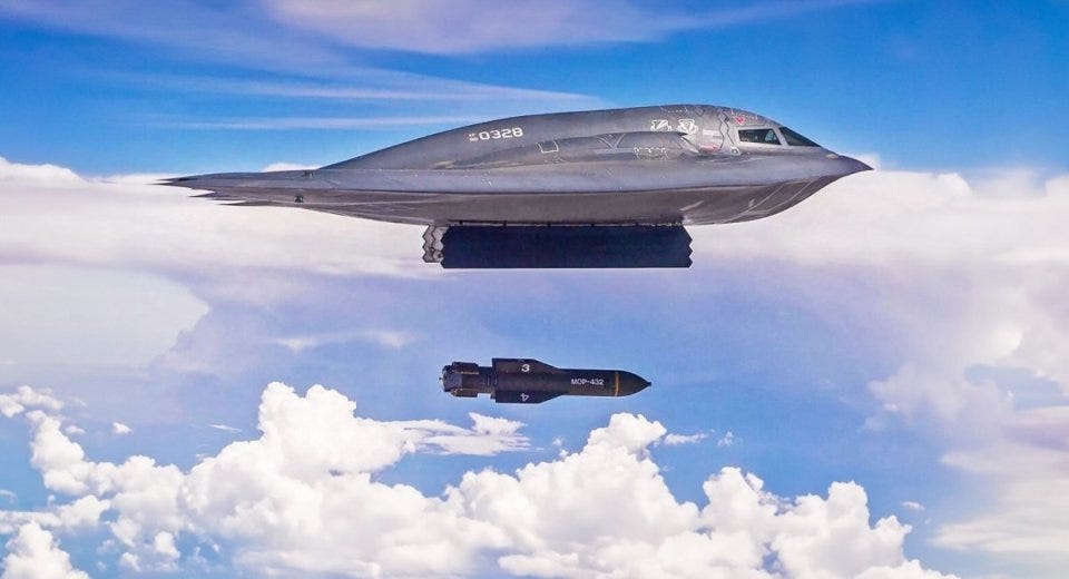 B-2 Spirit bomber releasing a bomb.