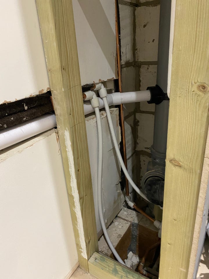 pipework installed and connected into the wall
