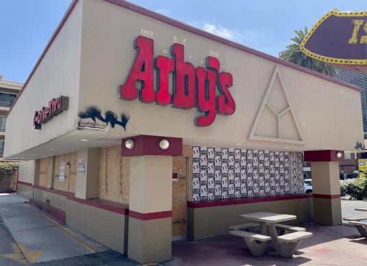 A boarded-up Arbys restaurant in Los Angeles, California