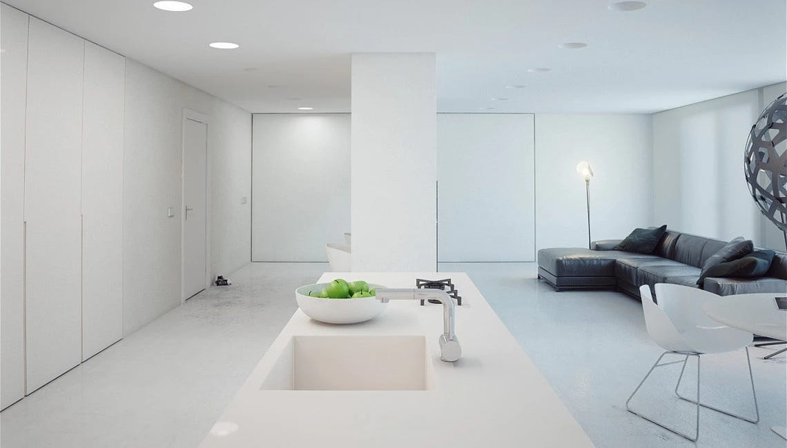 all white room with white floors, white chairs, and a gray couch all white room with white floors, white chairs, and a gray couch