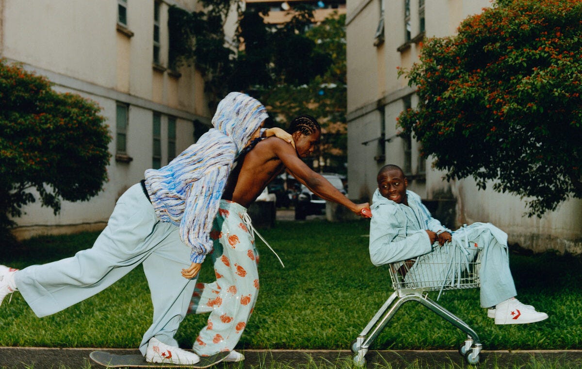 Tyler Mitchell photograph of a young skater in motion, bathed in dreamy, golden light.