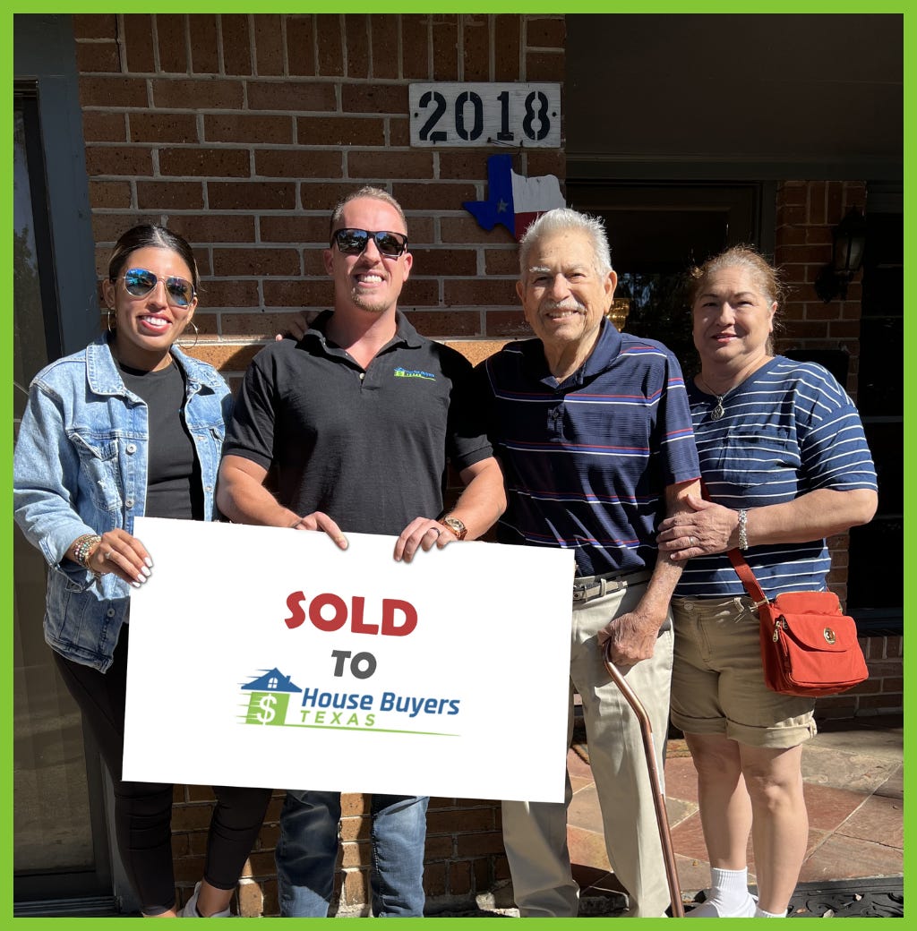 Four people standing outside a brick house, holding a sign that reads Sold to House Buyers Texas