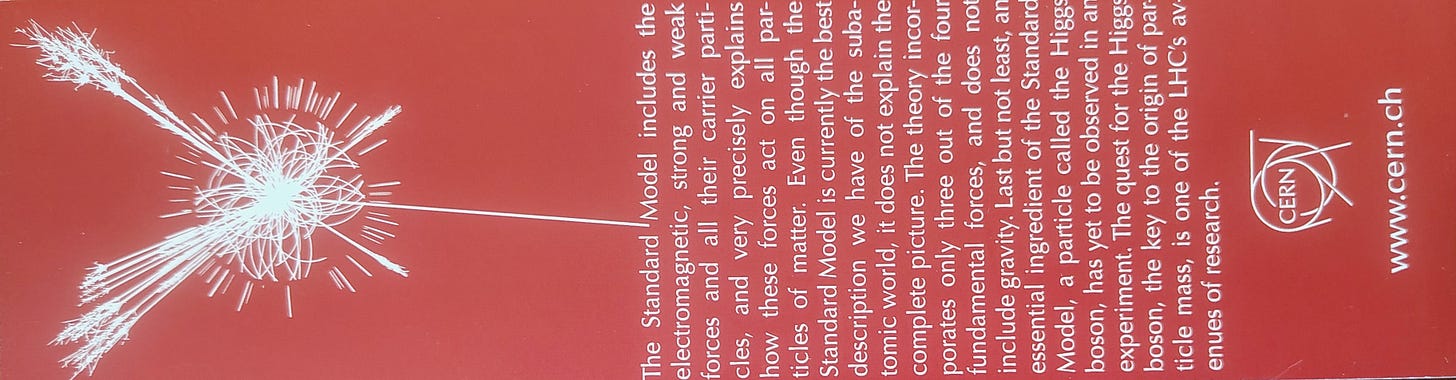 red bookmark lying horizontally with white writing and white design on left that looks like an explosion