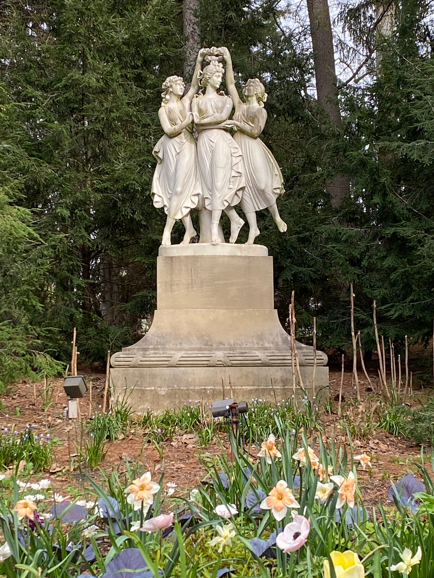 The Three Graces statue on the grounds of Newfields