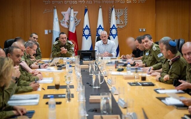 IDF Chief of Staff Lt. Gen. Herzi Halevi (center left) and Shin Bet head Ronen Bar (center right) hold an assessment with military and defense officials at the IDF HQ in Tel Aviv, July 28, 2024. (Israel Defense Forces)