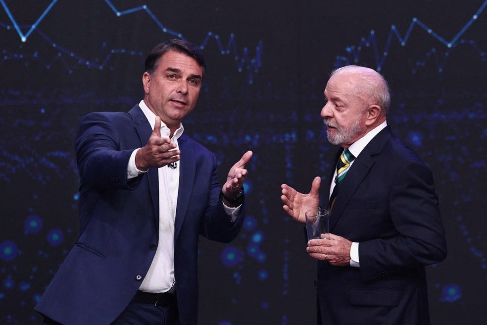 Lula e Flávio Bolsonaro: Contraste de estilos marca primeiro debate | G1