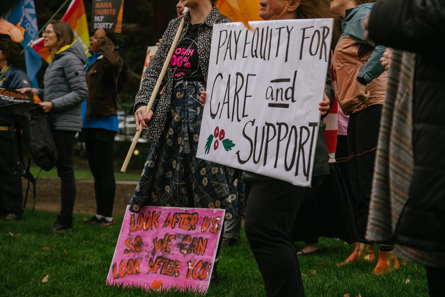 May be an image of 7 people, crowd and text May be an image of 7 people, crowd and text