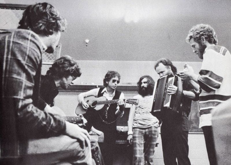 Bob Dylan with The Band. I saw them during this tour at Madison Square  Garden in New York City in 1974. My family somehow got tickets and off we  went. I was
