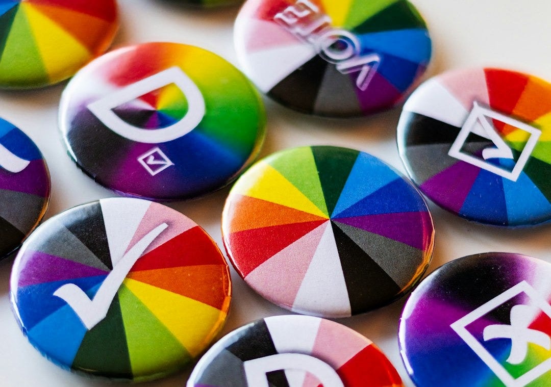 A bunch of colorful buttons sitting on top of a table A bunch of colorful buttons sitting on top of a table