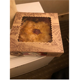 A box of pastries on a table

AI-generated content may be incorrect.