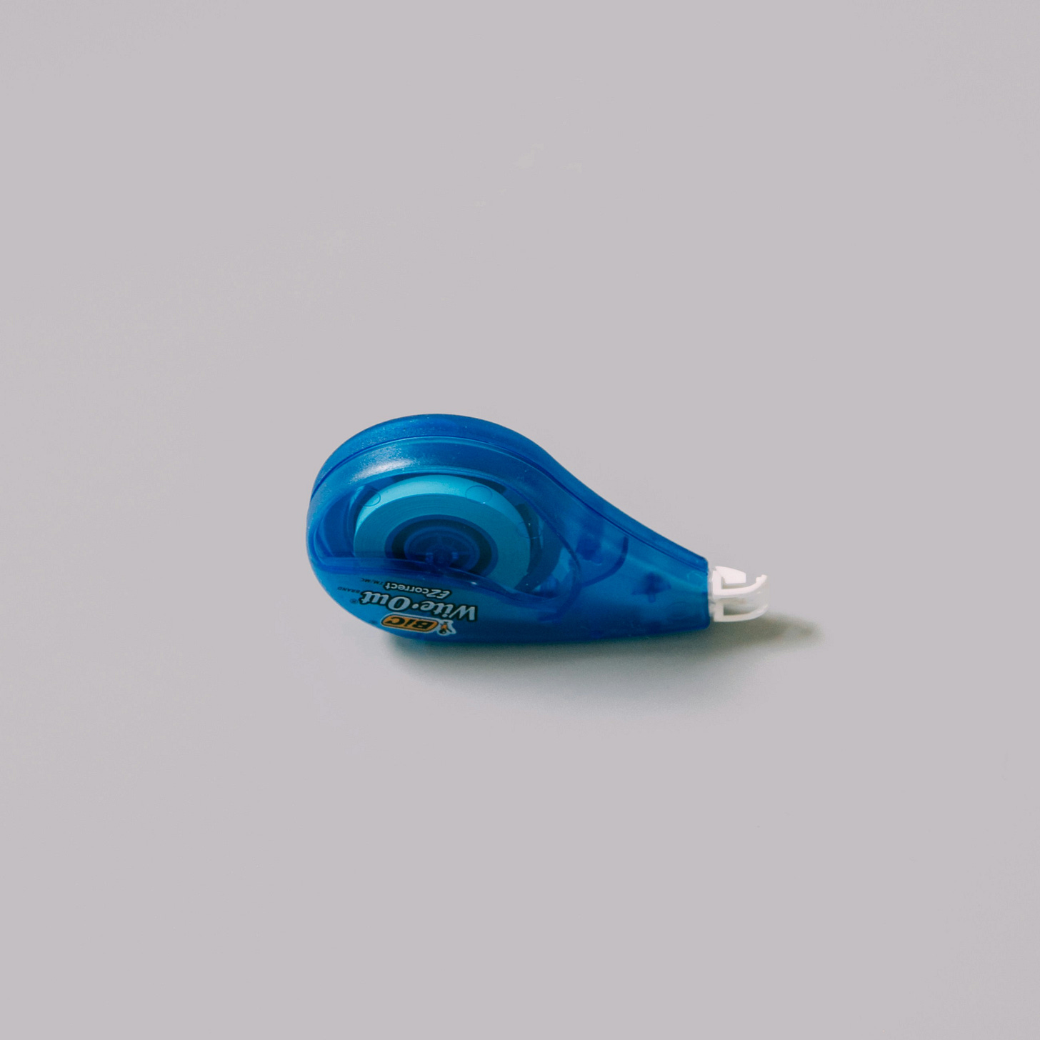 White background with centerd blue white out applicator. White background with centerd blue white out applicator.