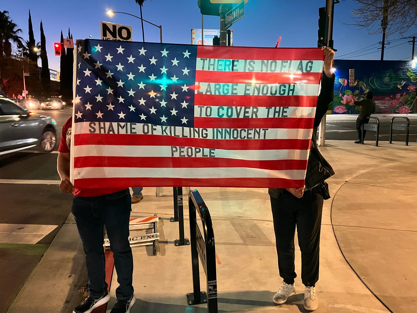 May be an image of text that says 'NO e THEREISNOHLAG PARGEENOUGH LARGE ENOUGH ΤO TOCOVERTHE SHAMETOEKILLINGINNOCENT SHAMEOEKILLNG OFKILLING INNOCENT SHHAME PEOPLE 超 τεχες'