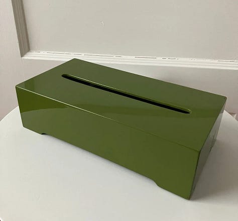 A hand holding a hand sanitizer spray bottle; a green glossy box tissue cover; a flat lay of supplements; a to-go cup of soup; the book cover for Nicotine by Nell Zink; linen striped sheets