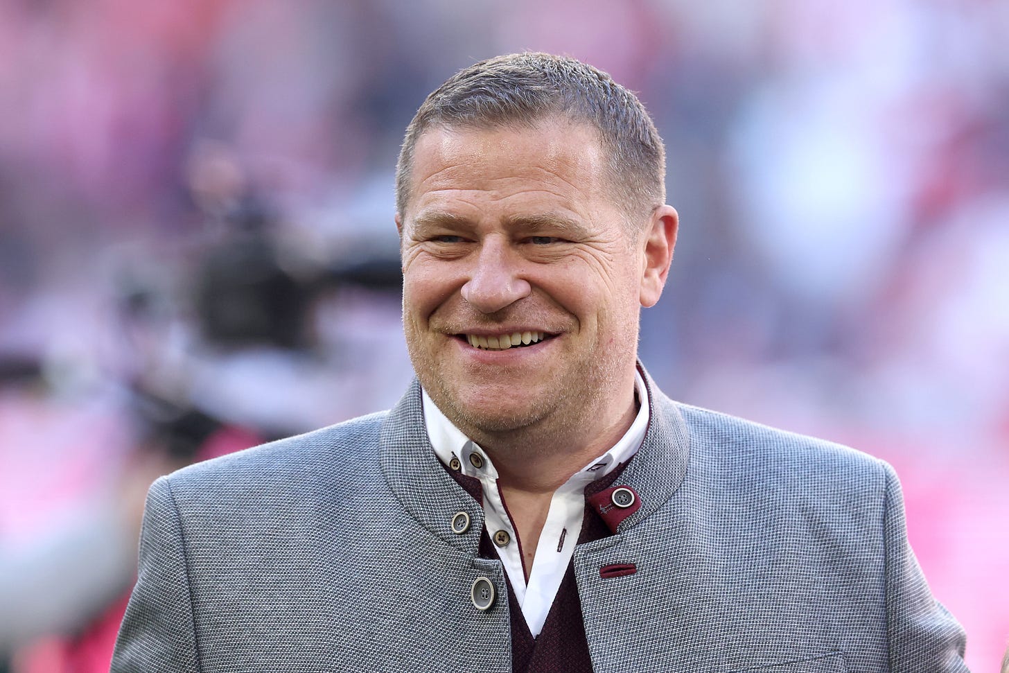 Bayern director of sport Max Eberl smiles.