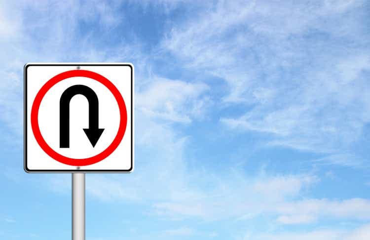 Turn back road sign