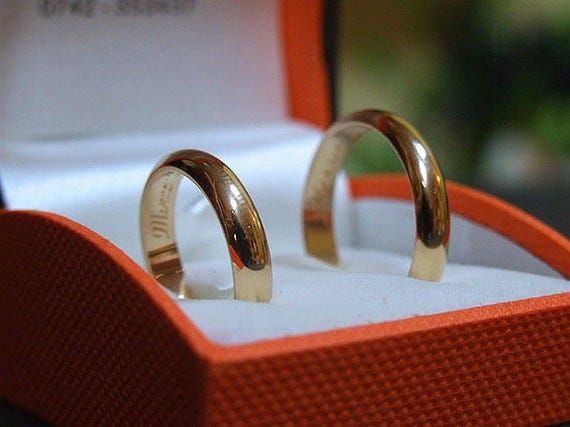 Spouse Support Wedding Rings Photo
