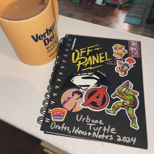 May be an image of coffee cup, diary and text