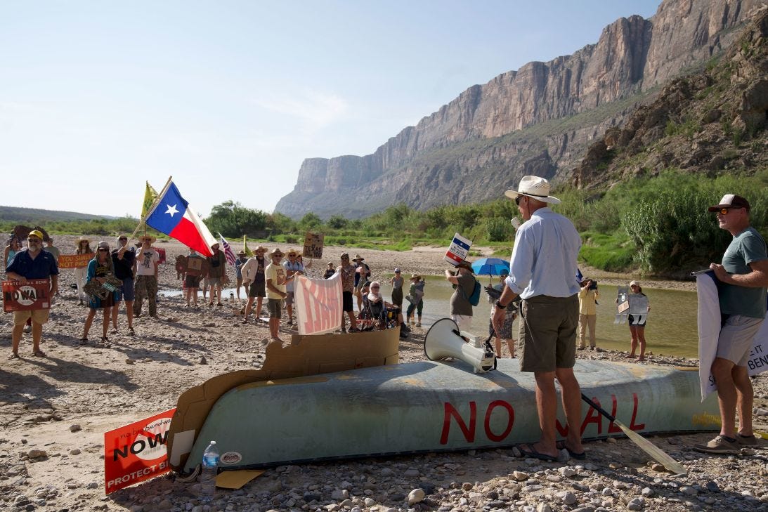 Protesters gather Wednesday near where the first bulldozer was seen inside Big Bend National Park, vowing to keep fighting against construction.
