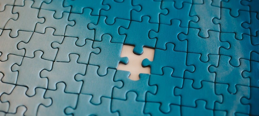 A piece of a puzzle with a missing piece