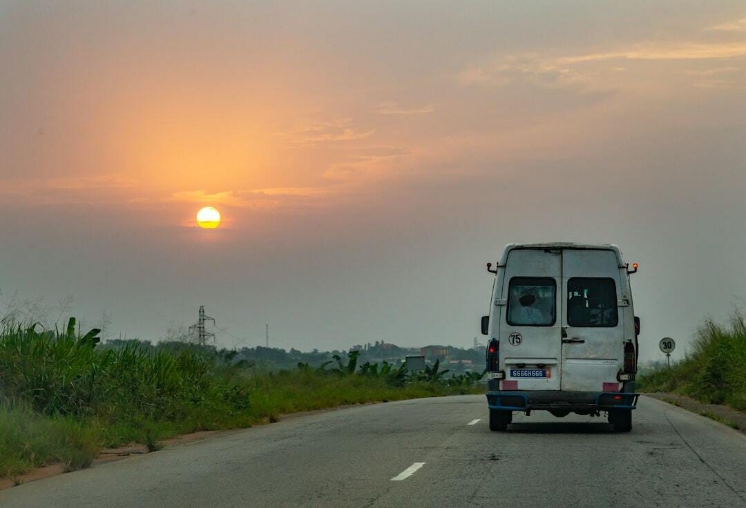 white van at road during daytime white van at road during daytime