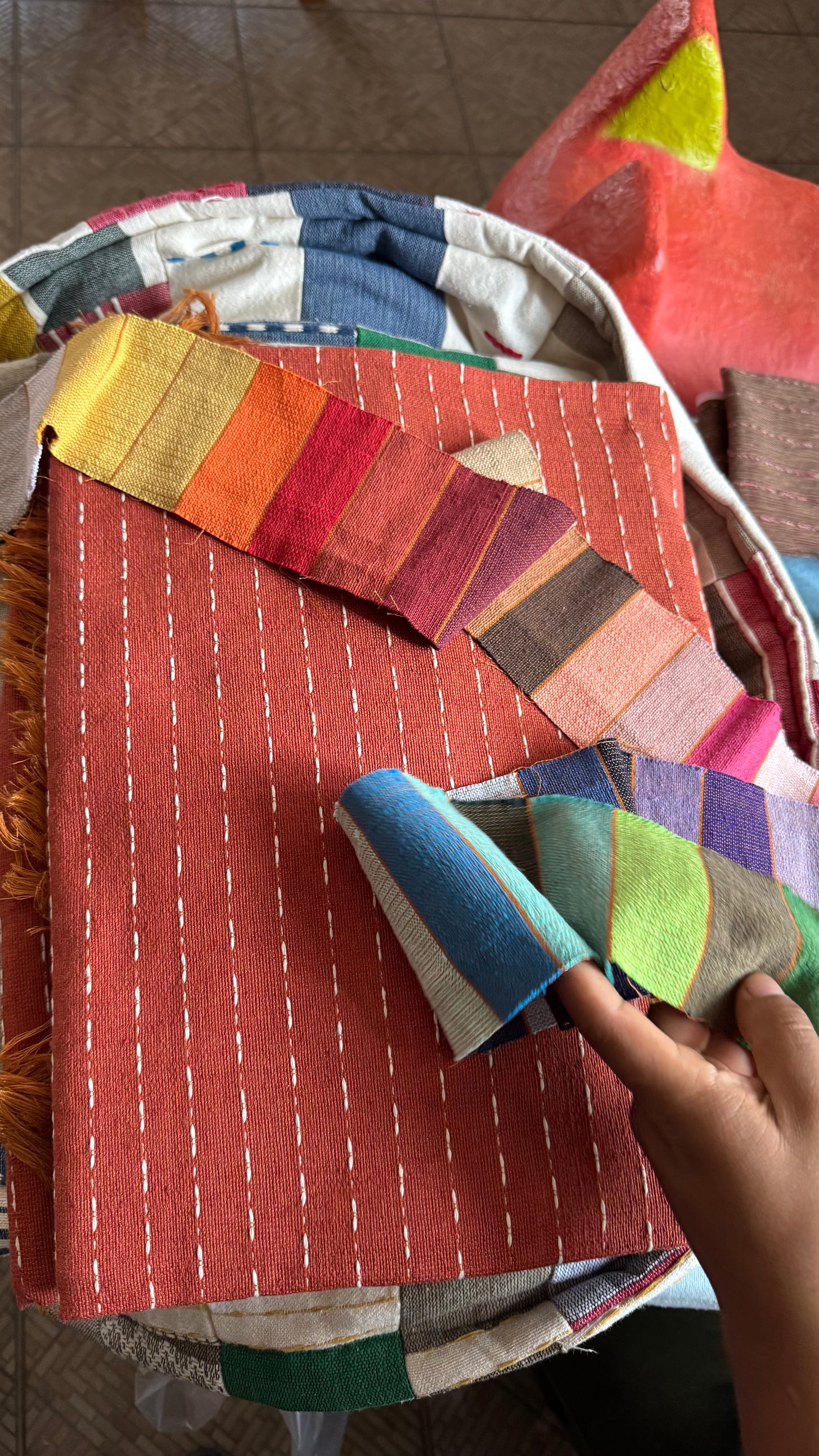 A tablecloth with a strip of color options above it.